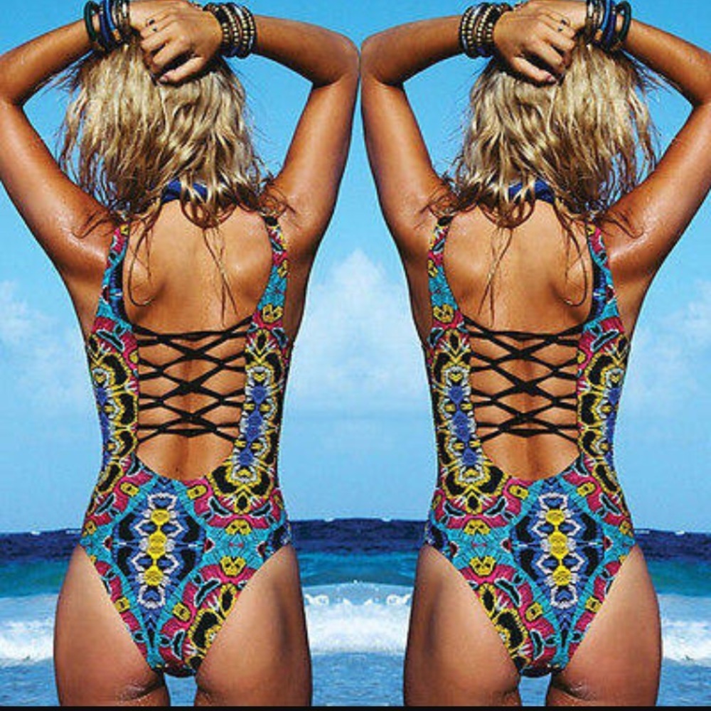COMING SOON! Tribal one piece w/ cross cross back - Picture 1 of 2